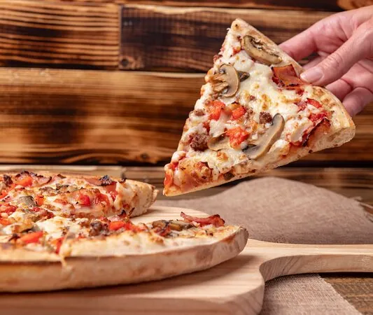 Pizzería Carlos | Mérida: Deliciosas pizzas en el corazón de Mérida